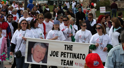 The Joe Pettinato Team carrying their banner during the Walk